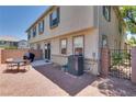 The backyard features desert landscaping, patio, and privacy fence perfect for outdoor living at 9112 Canoga Canyon Ct # 103, Las Vegas, NV 89149