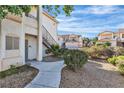 Apartment complex exterior with well-maintained landscaping and multiple residential buildings at 1300 S Arlington St # 120, Las Vegas, NV 89104