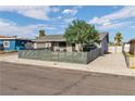Charming single-story home featuring a modern horizontal fence and well-maintained landscaping at 3682 Deer Creek Way, Las Vegas, NV 89115