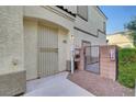 Exterior image displaying the front entrance and security gate of a condo or apartment at 6170 E Sahara Ave # 1061, Las Vegas, NV 89142