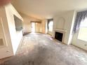 Spacious living room featuring a fireplace, and large windows at 7570 W Flamingo Rd # 202, Las Vegas, NV 89147