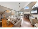 Cozy living room featuring vaulted ceilings and ample natural light at 8780 Autumn Wreath Ave, Las Vegas, NV 89129