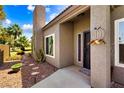 Inviting front entrance with desert landscaping and a decorative door at 1131 Golf Club, Laughlin, NV 89029