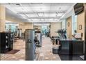 Well-lit gym with treadmills, weight machines, and sleek furnishings, perfect for fitness enthusiasts at 135 E Harmon Ave # 1403, Las Vegas, NV 89109
