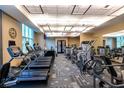 Well-equipped gym featuring modern cardio machines, weightlifting equipment, and ample natural light for a healthy lifestyle at 135 E Harmon Ave # 1403, Las Vegas, NV 89109