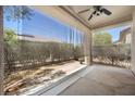 Relaxing covered patio with privacy screens, perfect for outdoor living at 2117 Bay Thrush Way, North Las Vegas, NV 89084