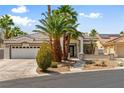 Charming single-story home with a well-maintained front yard and a two-car garage at 7920 Aspect Way, Las Vegas, NV 89149