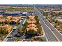 An aerial view showing the apartment buildings with convenient access to a main thoroughfare at 7950 W Flamingo Rd # 1003, Las Vegas, NV 89147