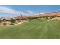Scenic view of a golf course in a desert community at 1407 Wheelwright Ct, Mesquite, NV 89034