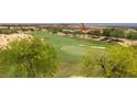 Beautiful golf course view with lush green fairways and trees at 1407 Wheelwright Ct, Mesquite, NV 89034