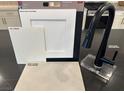 Display of kitchen countertop, cabinet, and faucet color and material options at 1551 Pacific Baza St, Las Vegas, NV 89138