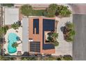 Aerial view of the property, highlighting the pool, solar panels, and landscaping at 2250 Bowie Cir, Henderson, NV 89014