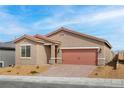 Charming single-story home with a well-manicured yard and appealing desert landscaping at 2727 Avril Point St, Las Vegas, NV 89156