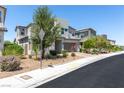 Contemporary two-story home with desert landscaping and a two-car garage at 298 Grant Ridge Dr, Henderson, NV 89012