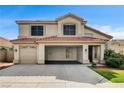 Charming two-story home with a tile roof, spacious three-car garage, and well-manicured front lawn at 313 Vista Glen St, Las Vegas, NV 89145