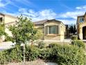 Inviting single-Gathering home with desert landscaping, neutral tones, and a well-manicured lawn at 3809 Van Ness Ave, North Las Vegas, NV 89081