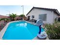 Private backyard pool and spa, perfect for relaxation and entertaining in a serene outdoor setting at 3913 Lilac Haze St, Las Vegas, NV 89147
