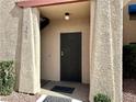 A close up of the front door with a black security screen at 4151 Sanderling Cir # 351, Las Vegas, NV 89103