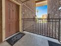 Cozy patio view with a secured railing and a glimpse of the community landscape at 4943 Indian River Dr # 133, Las Vegas, NV 89103