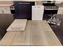 This photo showcases cabinet paint, hardware, and countertop options at 5872 Wisteria Walk, Las Vegas, NV 89148