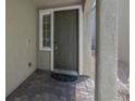 Inviting front door with brick steps, providing easy access to the home's main entrance at 9840 Chief Sky St, Las Vegas, NV 89178