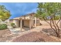 Enclosed backyard with patio area and low-maintenance landscaping at 2177 Hidden Ranch Ter, Henderson, NV 89052