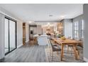 Open concept living space featuring sleek flooring and modern design at 3971 Foxboro Cir, Las Vegas, NV 89121