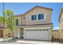 Charming two-story home with a two car garage and a cozy front yard at 7249 Linaria Rd, Las Vegas, NV 89113