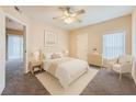 Cozy bedroom with neutral tones, including a comfortable bed and serene ambiance at 830 Carnegie St # 824, Henderson, NV 89052