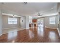 Spacious living room with hardwood floors that connects to kitchen area with ample space at 9005 Semillon St, Las Vegas, NV 89148