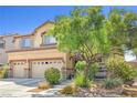 Inviting home featuring desert landscaping, a three-car garage, and mature shade trees at 1141 Brent Park Ct, Henderson, NV 89002