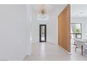 Stunning foyer with high ceilings, grand chandelier, and decorative doorway at 11926 Port Labelle Dr, Las Vegas, NV 89141