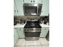 Close up on a modern stainless steel oven and range in a well-equipped kitchen at 2136 Bavington Dr # A, Las Vegas, NV 89108