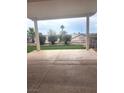 View from covered back patio, showing easy-care landscaping beyond a fenced yard at 2504 Libretto Ave, Henderson, NV 89052