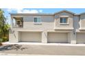 Desirable two-story townhome featuring a private balcony and convenient two-car garage at 2860 Sunflower Days Ave # 2141, North Las Vegas, NV 89031