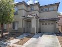 Inviting two-story home featuring a neutral color palette and attached garage at 4825 Shea Stadium Ave, Las Vegas, NV 89139