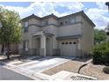 Attractive two-story residence with a tidy landscape and covered front porch at 4825 Shea Stadium Ave, Las Vegas, NV 89139