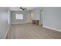 Inviting living room with neutral tones, modern floors, and a cozy fireplace at 5129 Midnight Oil Dr, Las Vegas, NV 89122