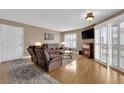 Comfortable living room with fireplace, shutters, modern furniture, and plenty of natural light at 6800 E Lake Mead Blvd # 2089, Las Vegas, NV 89156