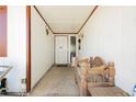 Covered front porch with bench at 7701 Pheasant Ln, Las Vegas, NV 89145