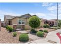 Attractive home with a manicured front yard and a charming walkway at 2207 Valdina St, Henderson, NV 89044