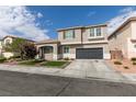 Beautiful two-story home with an attached garage and manicured front lawn at 2418 Brockton Way, Henderson, NV 89074