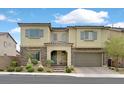Charming two-story home showcasing a stone facade, tile roof, and an attached two-car garage at 404 Lost Horizon Ave, Henderson, NV 89002
