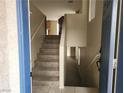 Entryway with a view of the stairs leading to the second floor at 5052 Whistling Acres Ave, Las Vegas, NV 89131