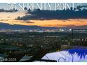 Enjoy Las Vegas city views from the backyard while relaxing poolside in this luxury backyard at 515 Serenity Point Dr, Henderson, NV 89012