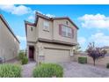 Charming two-story home featuring desert landscaping and a two-car garage at 5503 Jinan St, Las Vegas, NV 89148