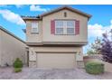 Charming two-story home featuring desert landscaping and a two-car garage at 5503 Jinan St, Las Vegas, NV 89148