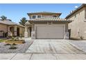 Charming two-story home with tile roof, two-car garage, and desert landscaping at 5834 Autumn Harvest Ave, Las Vegas, NV 89142