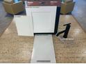 Selection board featuring white cabinet doors, sleek matte black faucet, and bright quartz countertop at 1543 Pacific Baza St, Las Vegas, NV 89138