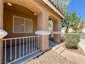 Inviting front porch with decorative arches and desert-friendly landscaping at 1995 Sundown Canyon Dr, Henderson, NV 89014
